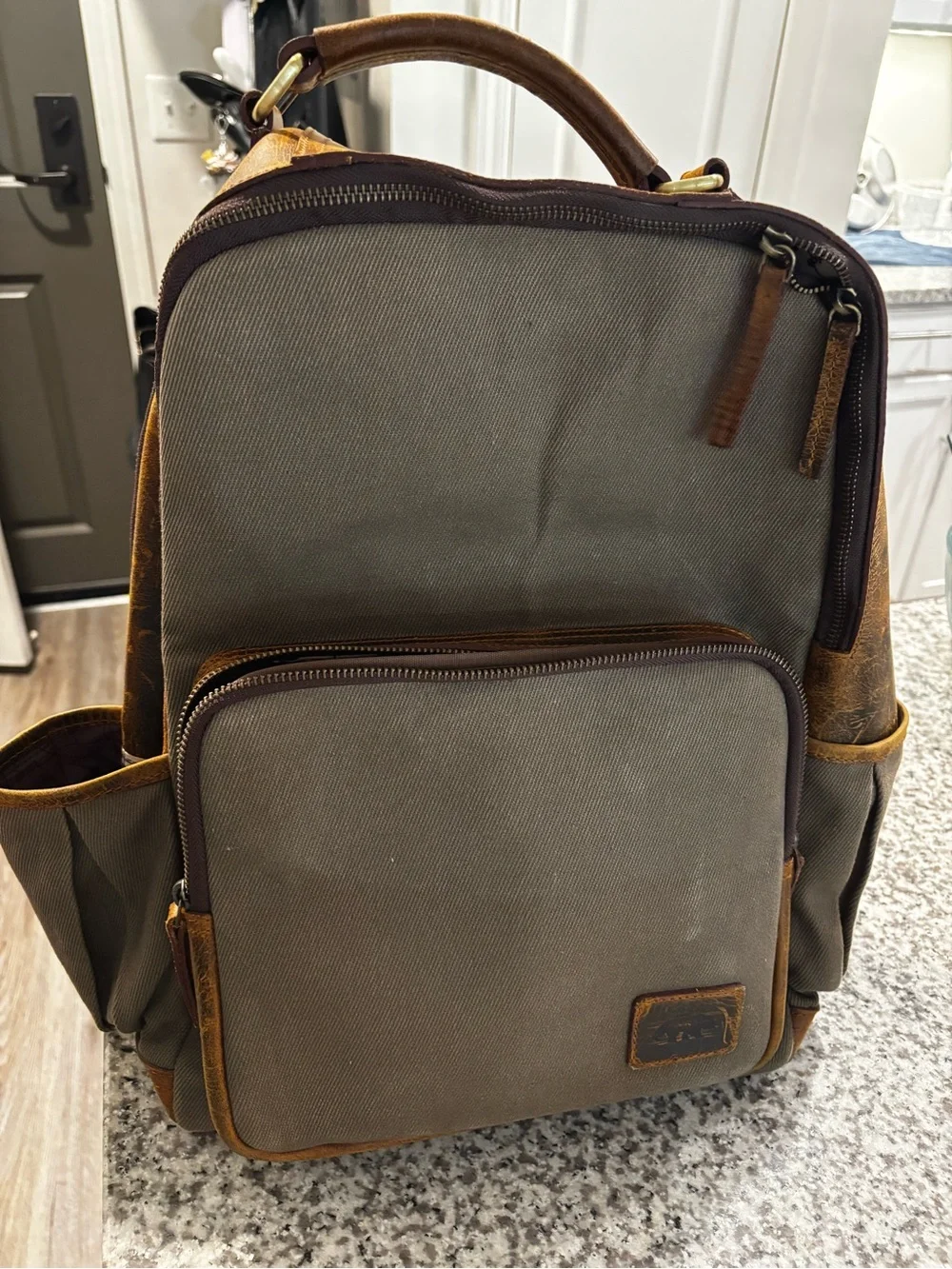 Kodiak Canvas Backpack in Olive Green with Brown Trim